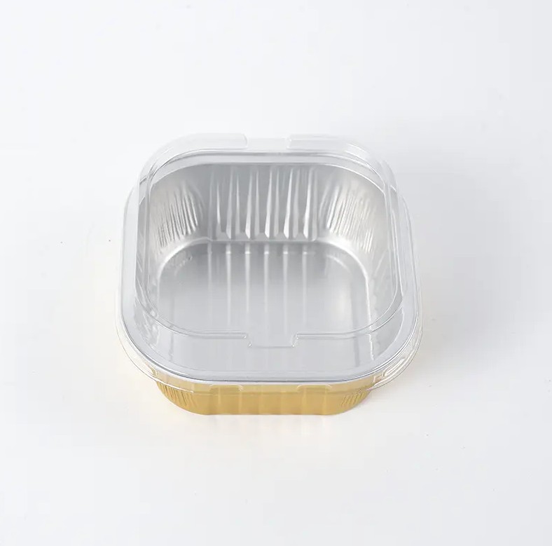 Hvordan realiseres det rynkesikre design af Square Wrinkle-Free Aluminum Foil Food Container under produktionsprocessen, og hvilken indflydelse har det på brugen af ​​beholderen?